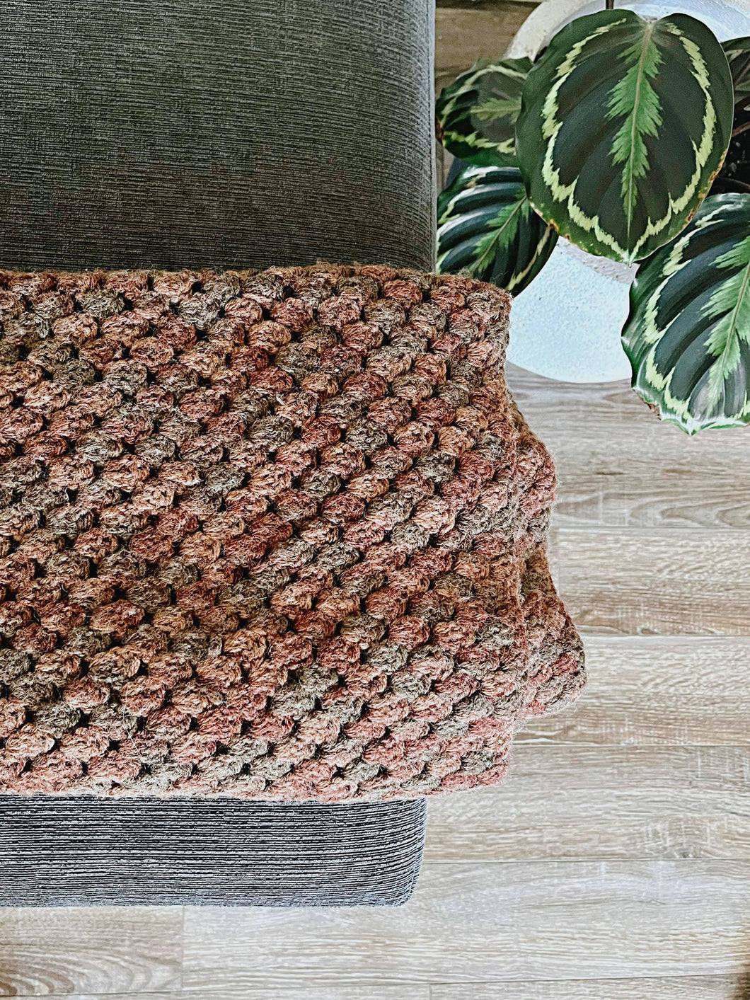 Brown/green knit throw blanket
