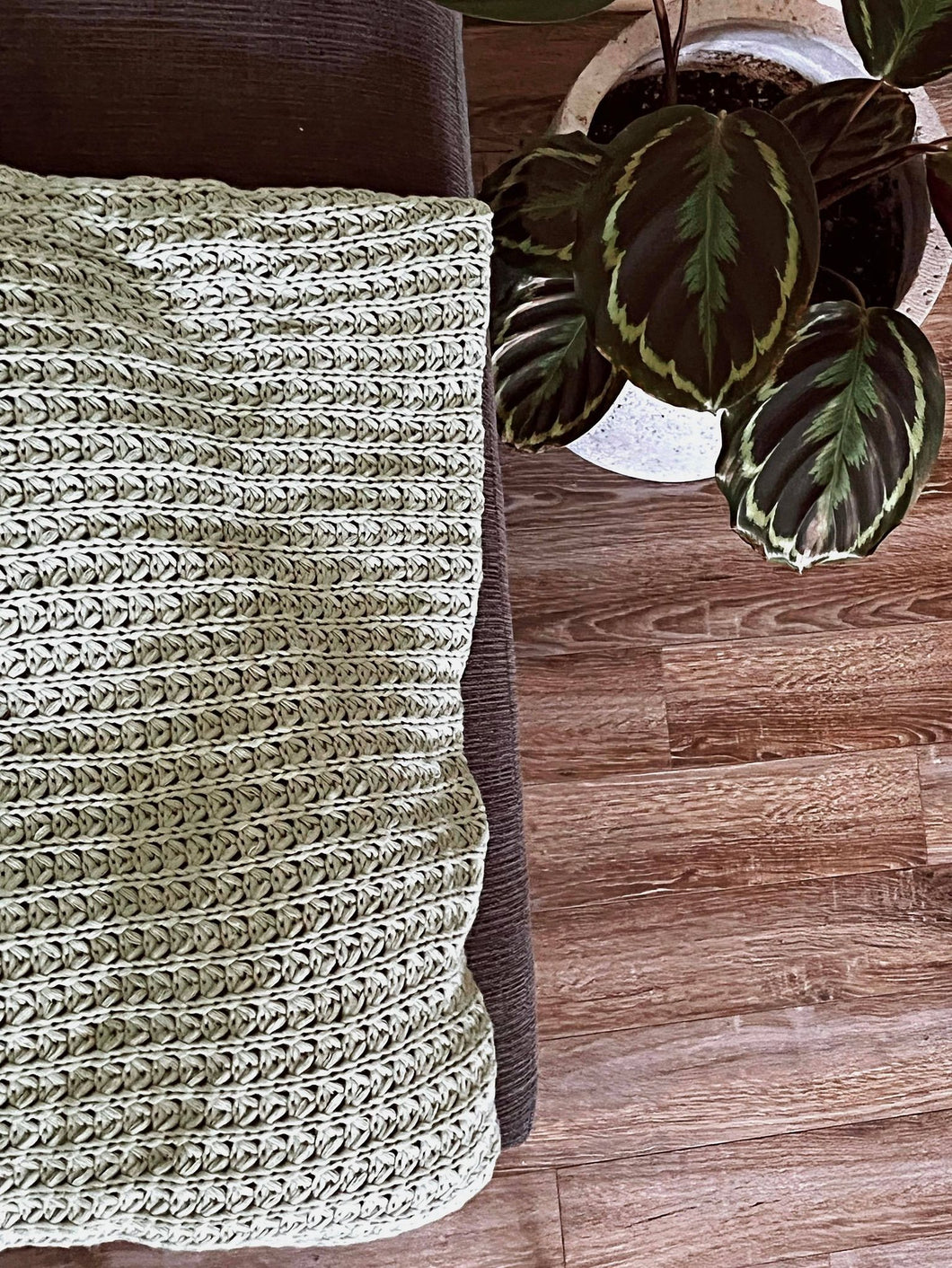 Light blue/green knit throw blanket